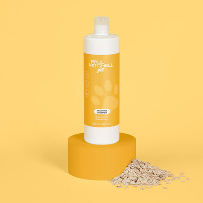 Tear-Free Shampoo (Pet) - Salon Blissful - Paul Mitchell - 16.9 oz product displayed on yellow stand with yellow background