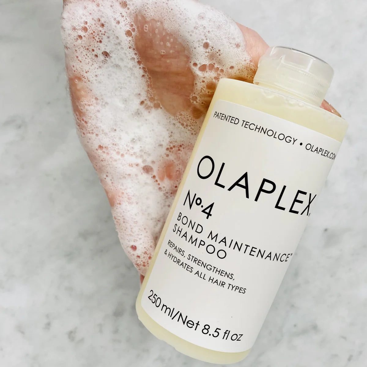 Olaplex No.4 Bond Maintenance Shampoo flatlay